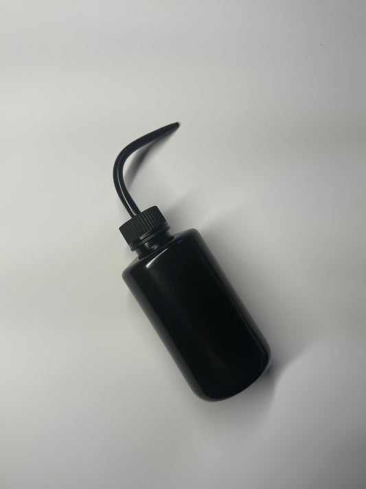 Squeeze Rinse Bottle